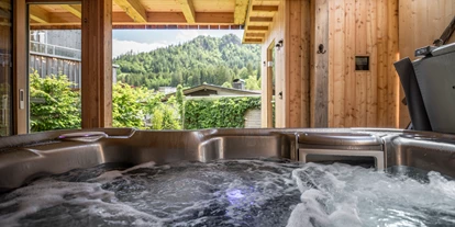 Hüttendorf - Weng (Goldegg) - Whirlpool im Premium XL Chalet Main Lodge - ALPEGG CHALETS