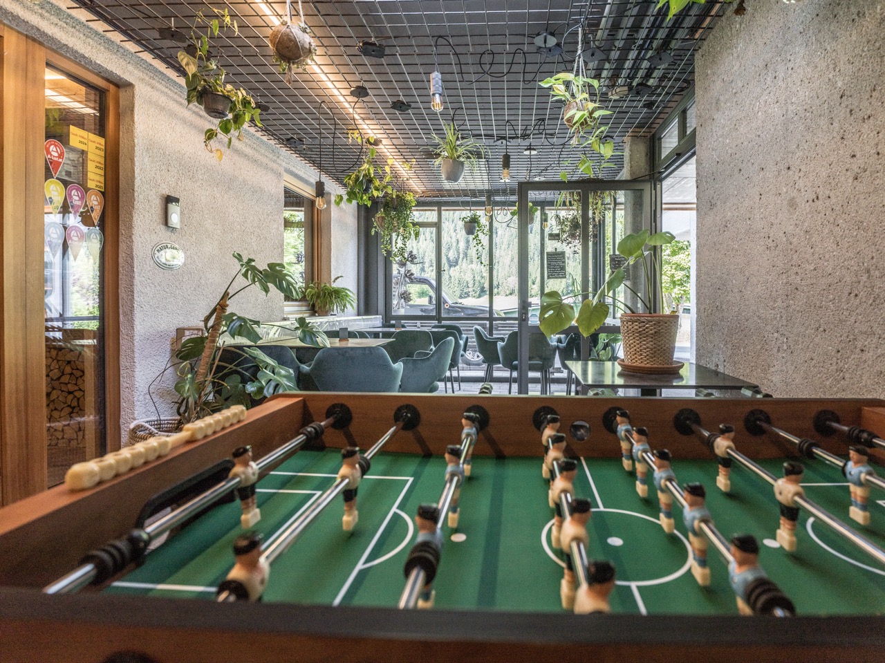 Chalet: Lust auf eine Runde Kickern? Im Haupteingang Bereich könnt ihr euch austoben. - ALPEGG CHALETS