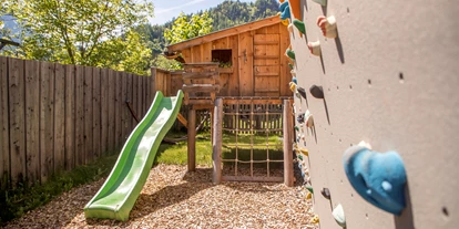 Hüttendorf - Weng (Goldegg) - Spielealm für die Kleinen und Boulderwand für die Großen – Spaß und Abenteuer für die ganze Familie. - ALPEGG CHALETS