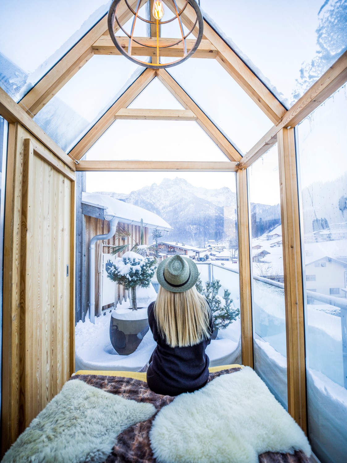 Chalet: Glashaus mit Bergblick auf der Rooftop Terrasse vom Premium Plus Chalet Berg.Heimat - ALPEGG CHALETS